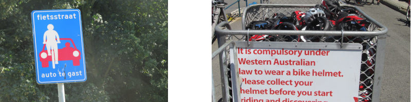 Fahrradschilder, links „Auto zu Gast“, rechts „It is compulsore to wear a bike helmet”