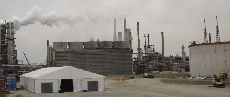 A glum image in grey: aging concrete and steel, vapours in the air.