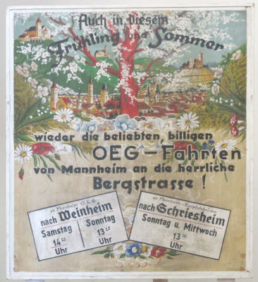 Ein buntes Plakat mit Kirschblüte und Burgen: „Auch in diesem Frühling und Sommer wieder die beliebten, billigen OEG-Fahrten von Mannheim an die herrliche Bergstrasse!“