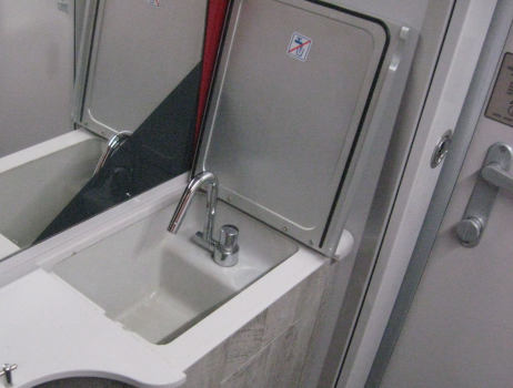 A stowaway sink with a flap that can hide it away.